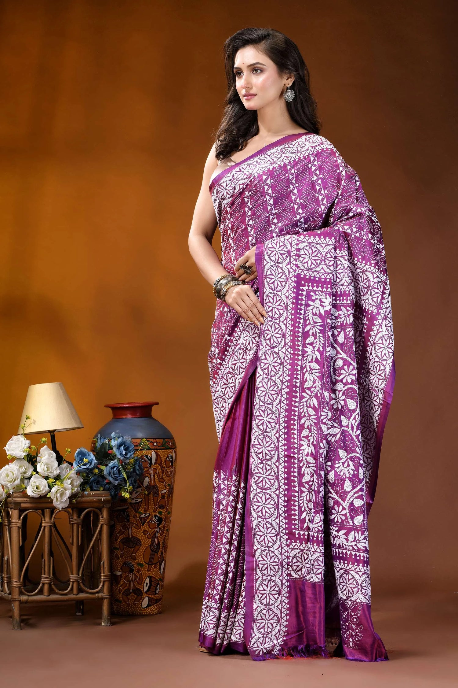 Plum floral design handcrafted silk kantha work saree woman wears vibrant purple white 3