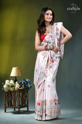 Porcelain white multi-thread floral motif hand embroidery silk lambani saree woman wears white saree intricate 6