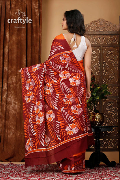 Premium cotton batik saree with alpana design - handcrafted luxury maroon orange floral batik saree 5