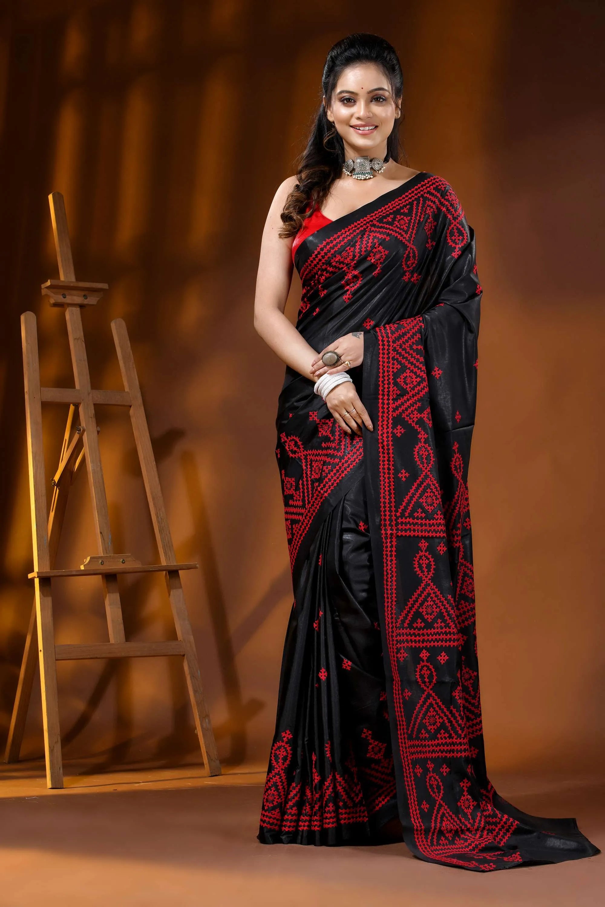 Raven black silk kutch embroidery saree with red geometric motif 1