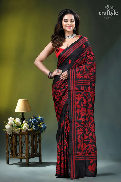 Red thread work floral motif silk kantha stitch saree in black woman wears black red floral 1