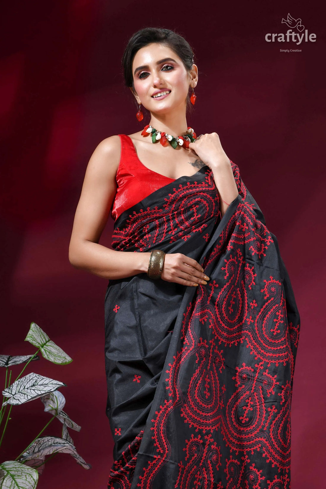 Red thread work handcrafted gujrati stitch silk saree in charcoal black black saree intricate red paisley 2