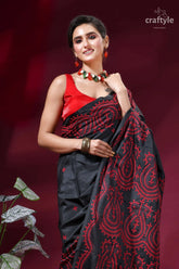 Red thread work handcrafted gujrati stitch silk saree in charcoal black black saree intricate red paisley 2