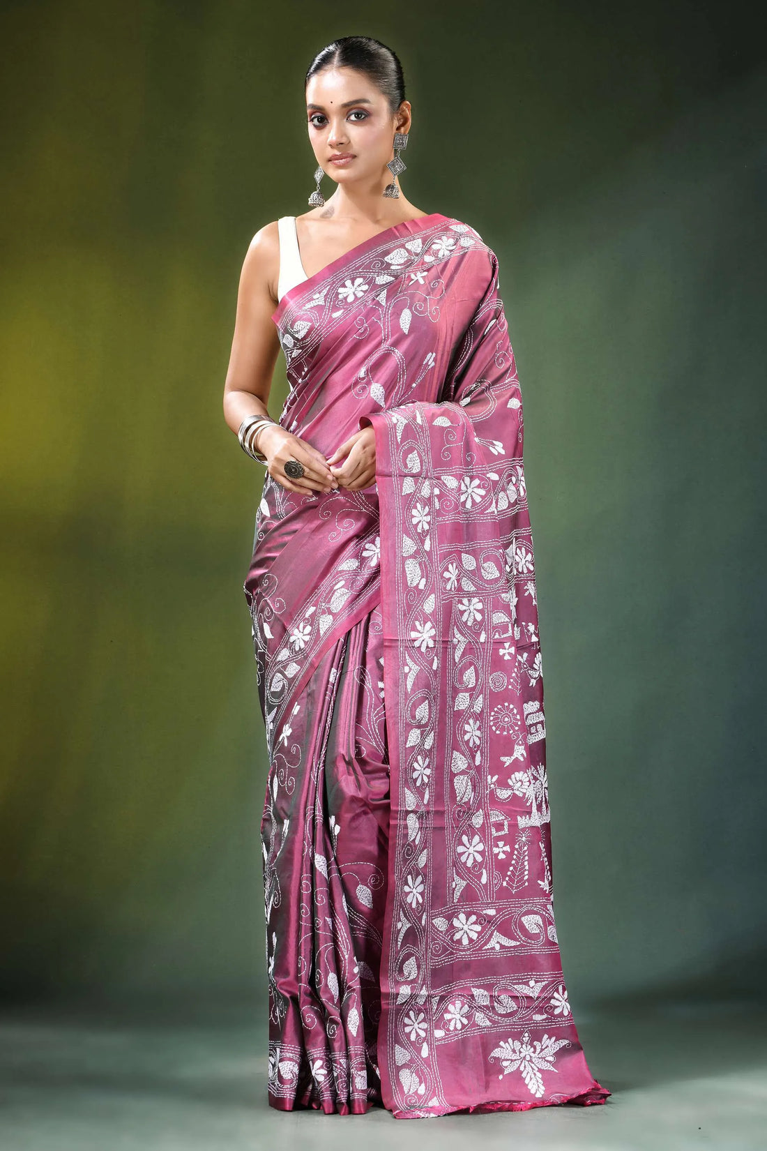 Rose pink village theme kantha embroidery silk saree woman wears rich maroon 1