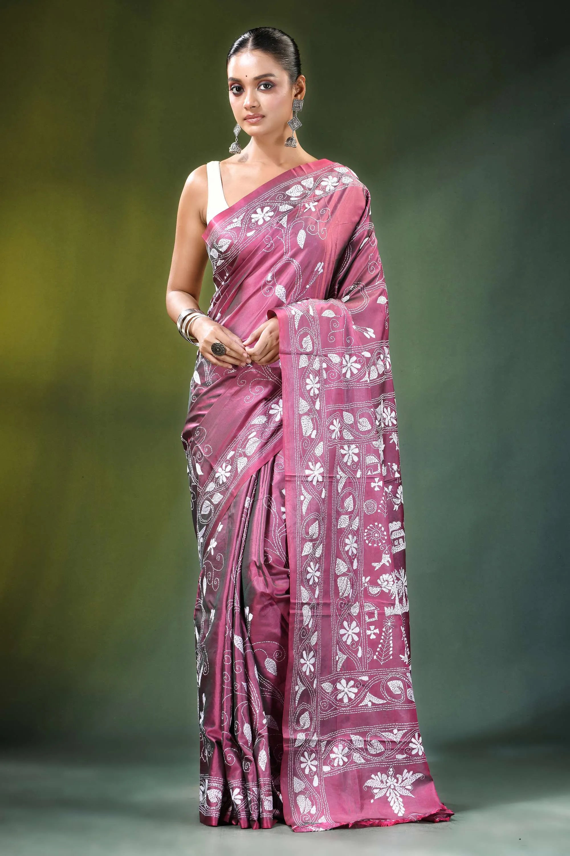 Rose pink village theme kantha embroidery silk saree woman wears rich maroon 1