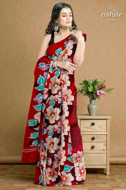 Ruby red floral hand batik pure mulberry silk saree woman wears vibrant red saree 3