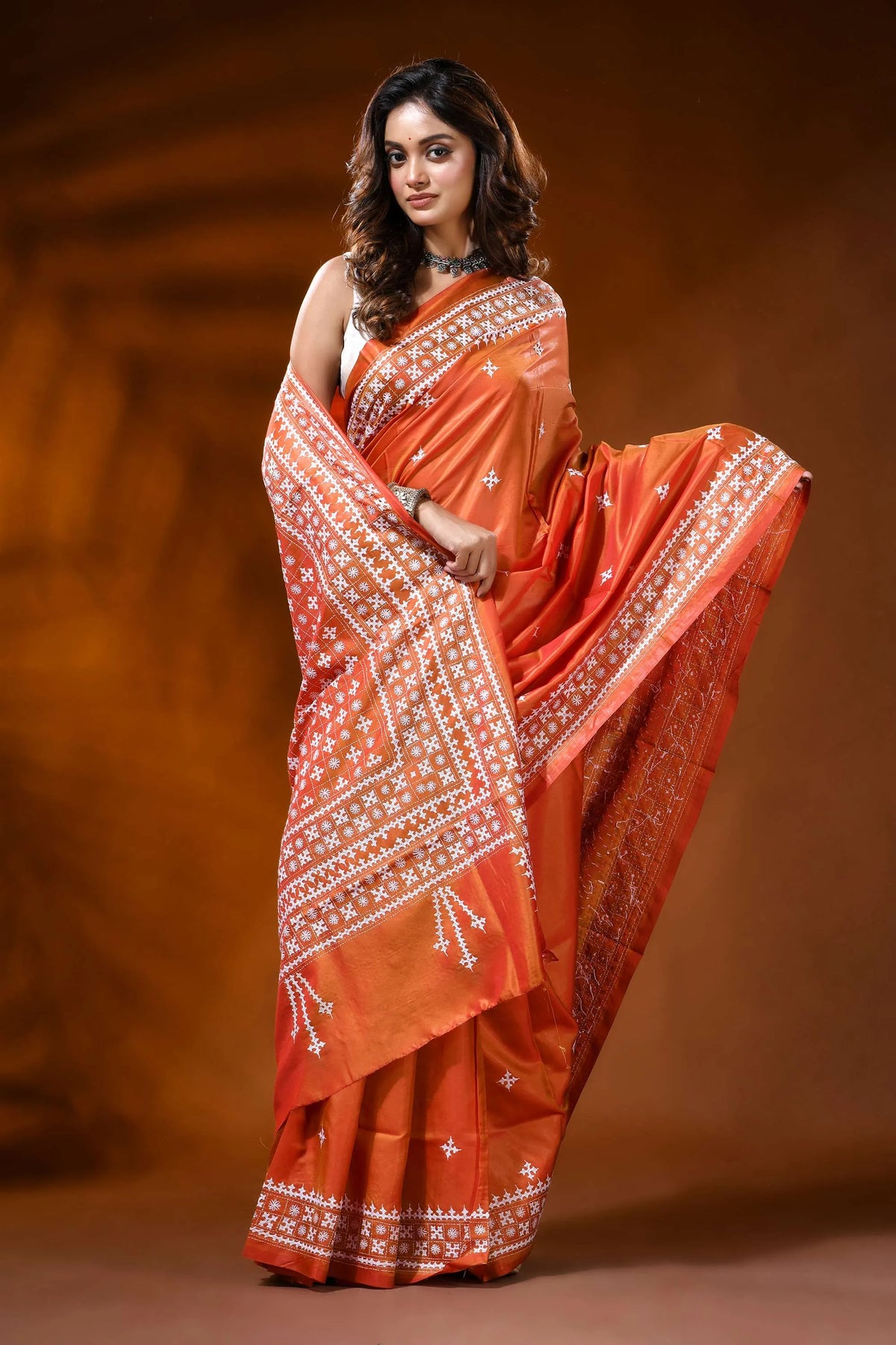 Rust orange silk kutch work saree with hand embroidered ethnic design 4