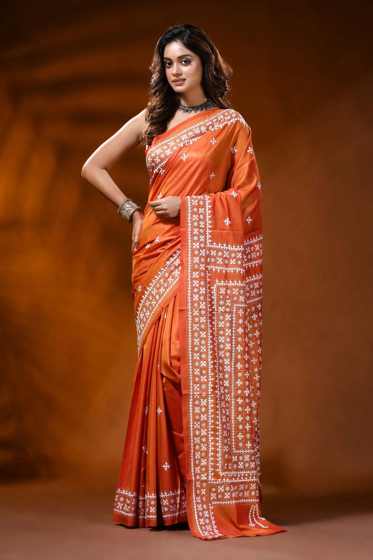 Rust orange silk kutch work saree with hand embroidered ethnic design 1