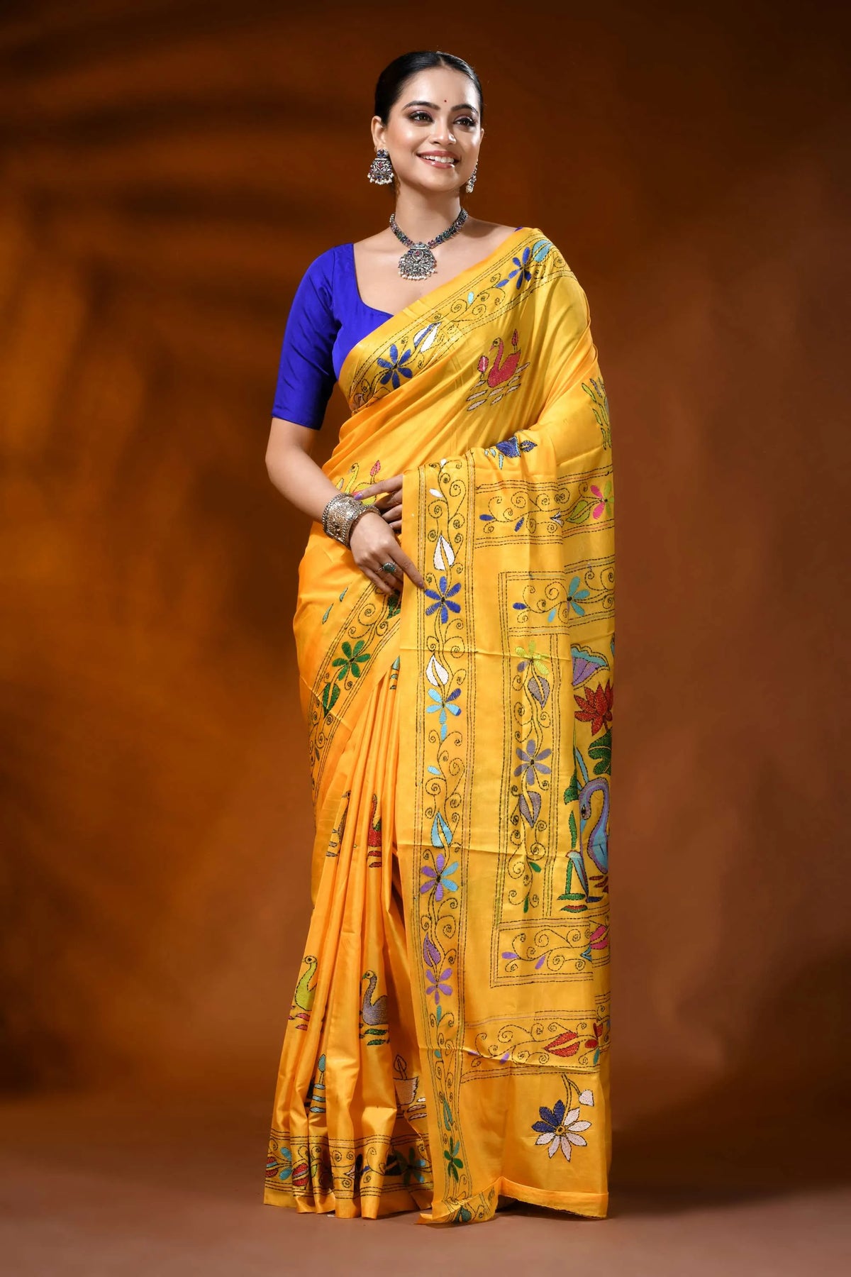 Saffron yellow handmade silk kantha saree with swan lotus design 6