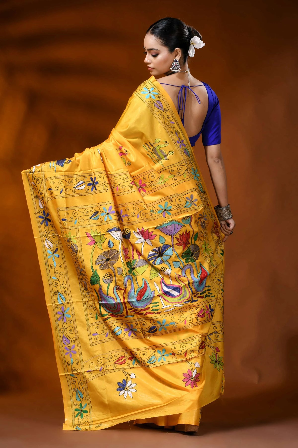 Saffron yellow handmade silk kantha saree with swan lotus design 5