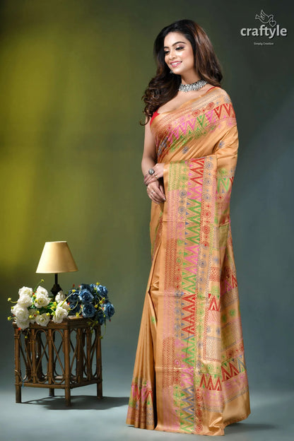 Sand brown silk saree with multi-thread lambani embroidery woman wears peach-colored silk saree 3