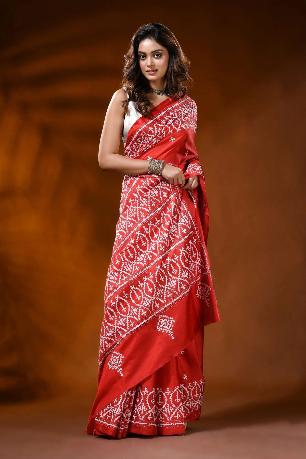 Scarlet red kutch work saree in silk with hand embroidered ethnic motif 4