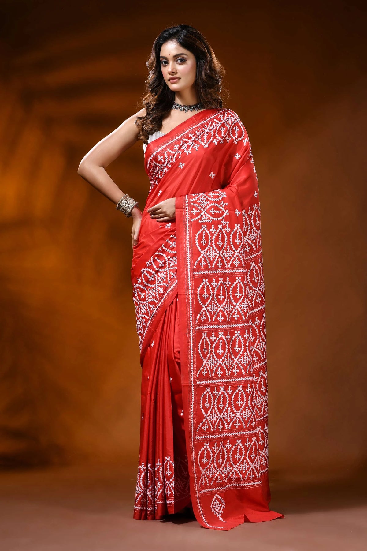 Scarlet red kutch work saree in silk with hand embroidered ethnic motif 6