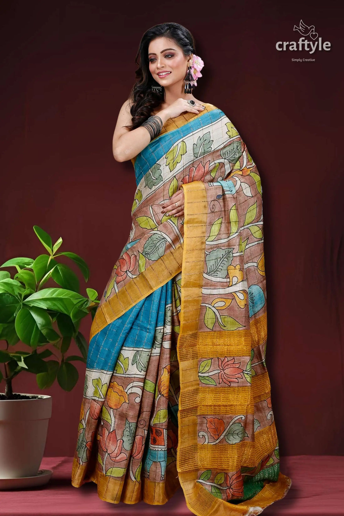 Sepia tan & blue hand painted zari border pure tussar kalamkari sari floral-patterned saree gold border 1