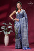 Shuttle grey handcrafted gujrati stitch silk saree - mirror work woman wears navy blue saree 1