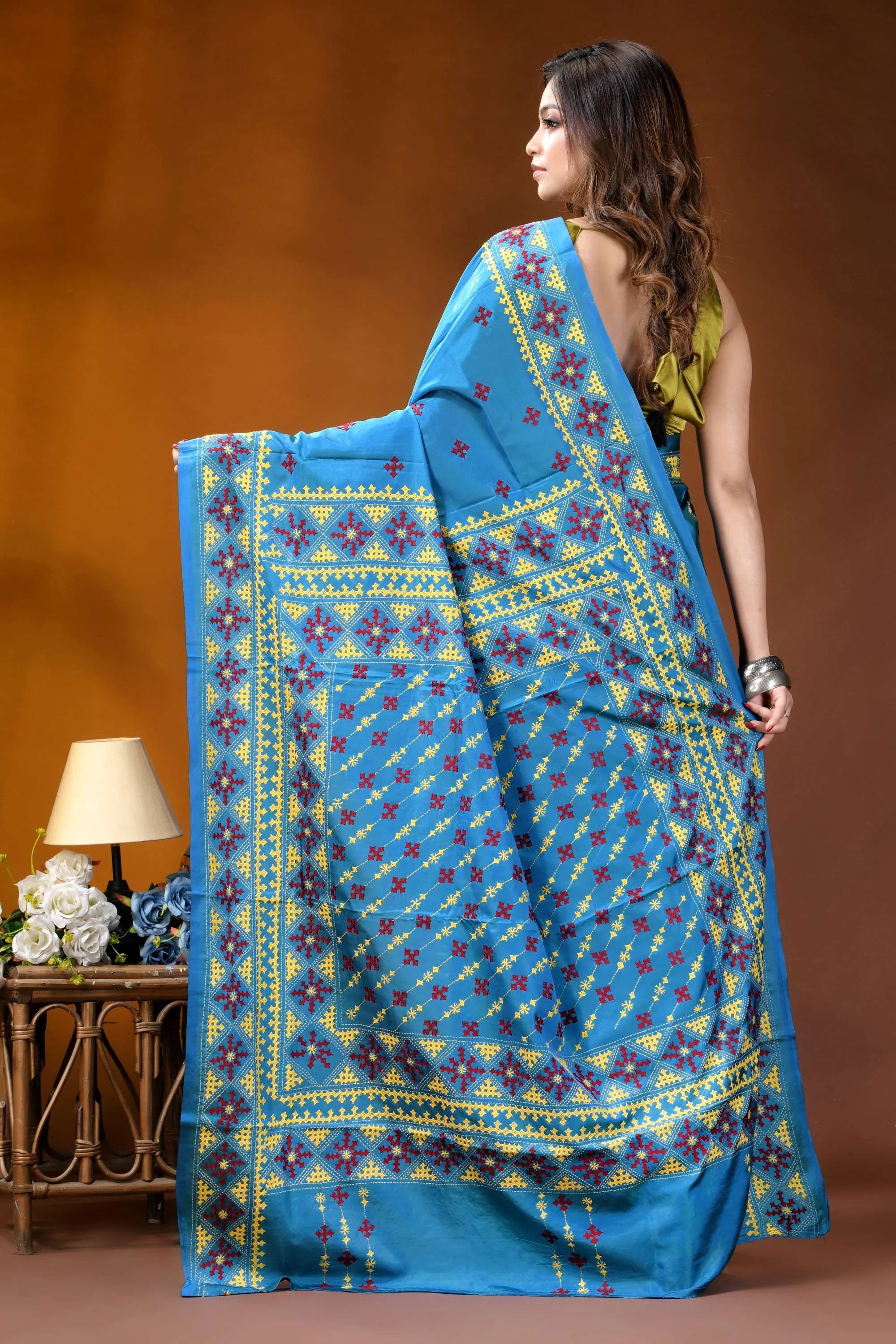 Sky blue ethnic motif hand embroidered gujrati stitch silk saree vibrant blue saree intricate yellow 5