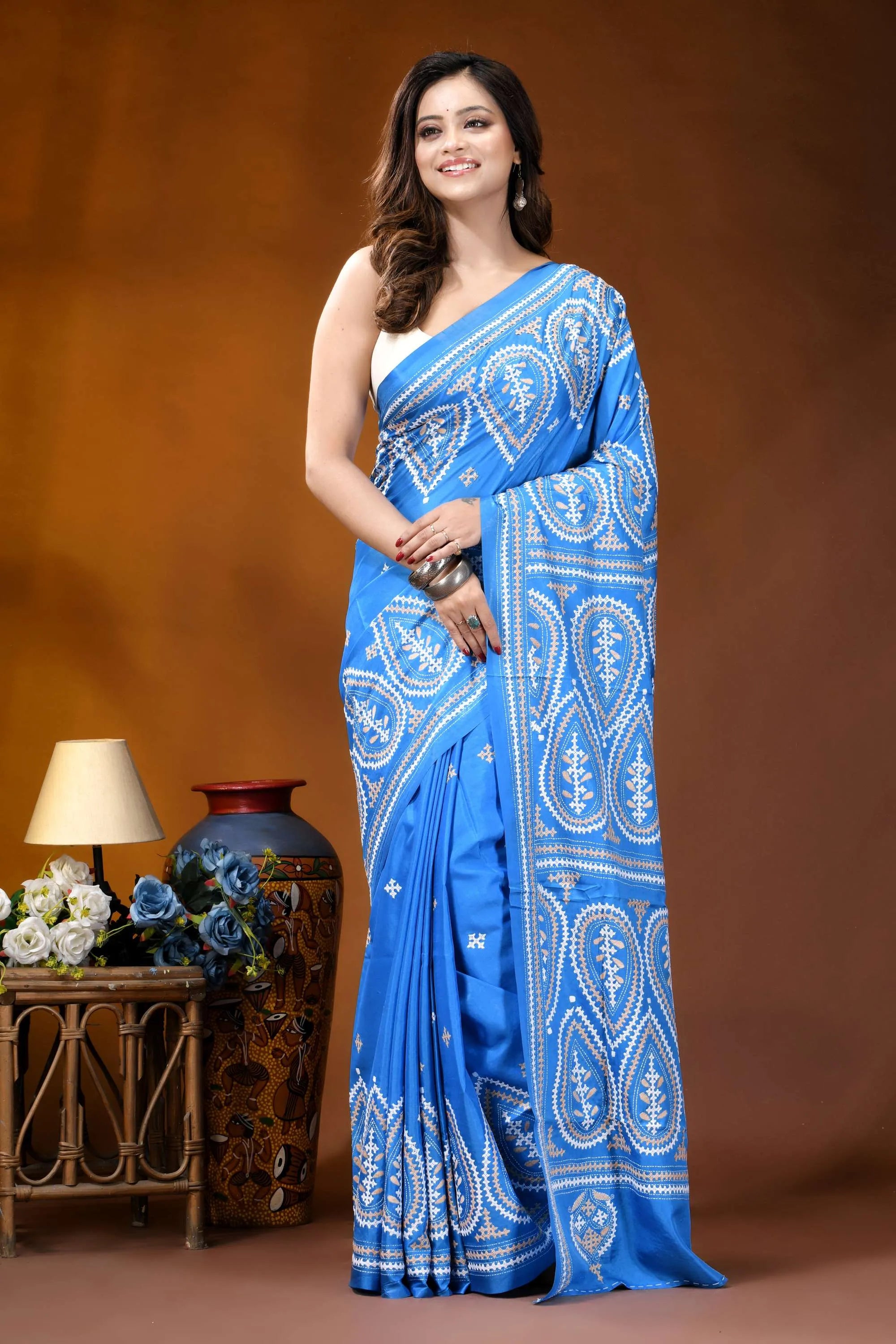 Sky blue paisley motif handcrafted kutch embroidered silk saree vibrant blue saree intricate white 8
