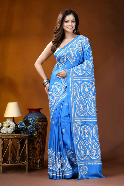 Sky blue paisley motif handcrafted kutch embroidered silk saree vibrant blue saree intricate white 1