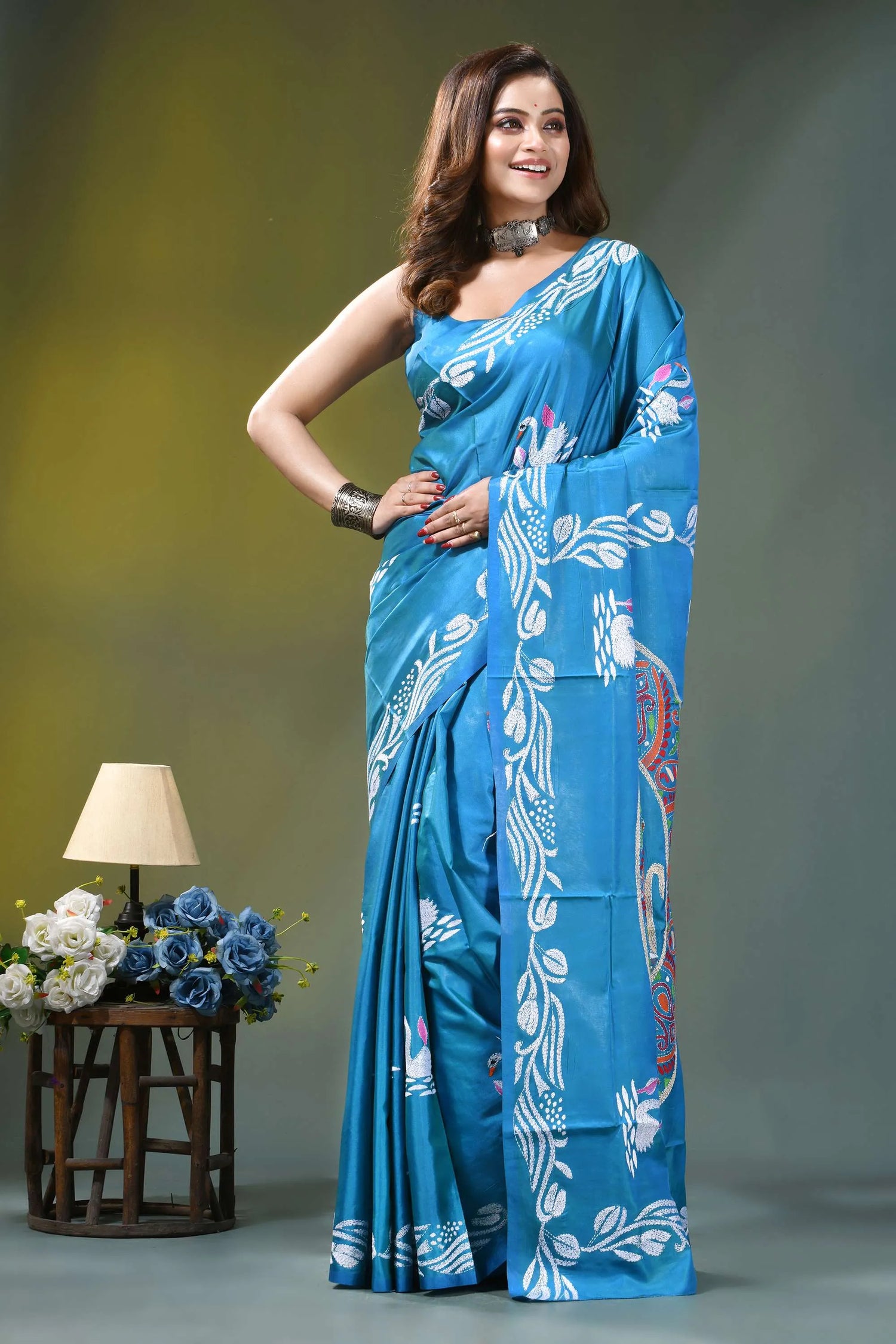 Sky blue swan motif hand embroidered silk kantha stitch saree vibrant blue saree adorned intricate 6