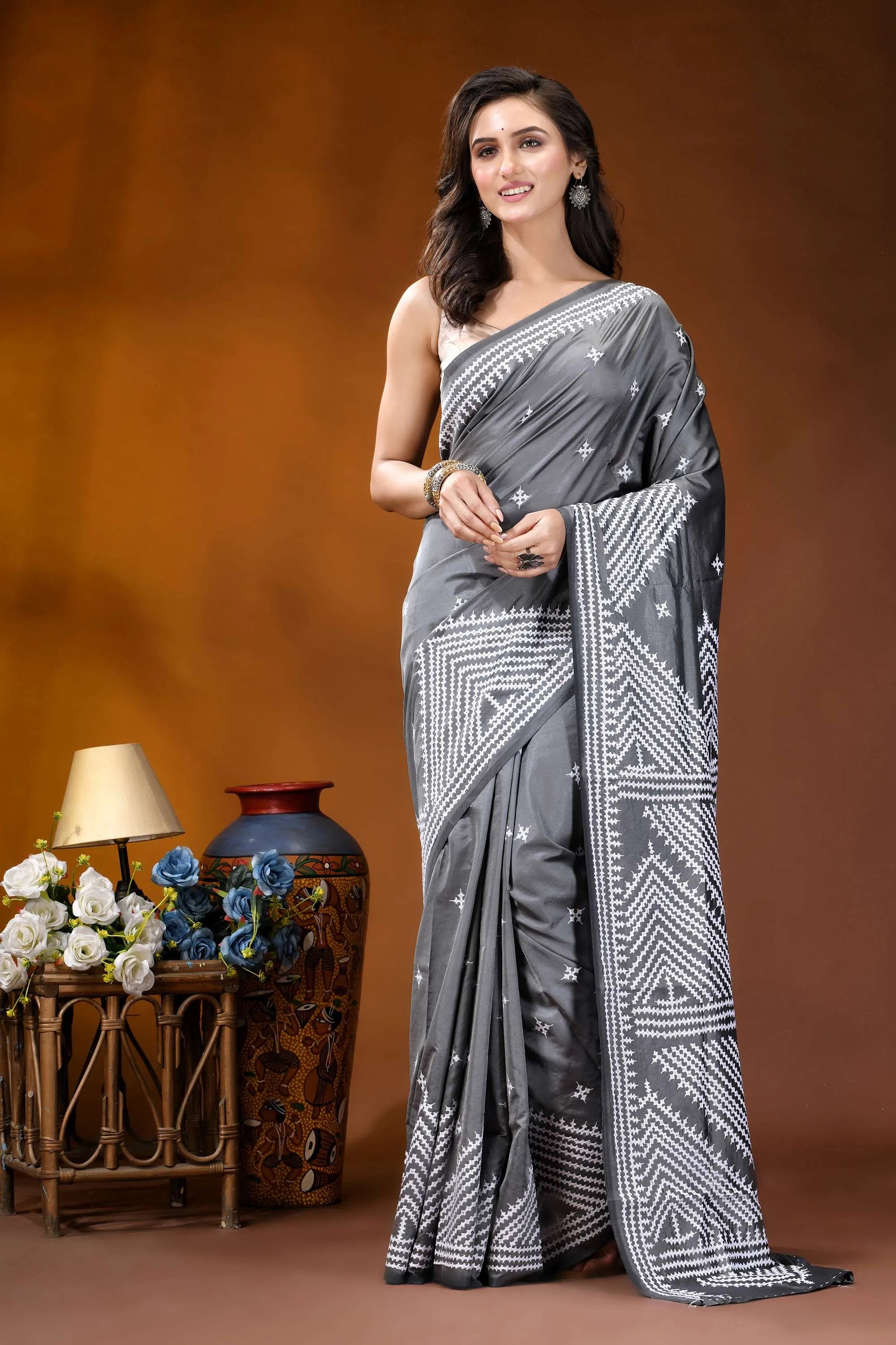 Slate grey handmade kutch embroidery silk saree - geometric pattern woman wears grey saree intricate 6
