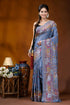 Slate grey multicolor geometric motif silk lambani embroidery saree woman wears light blue silk 1