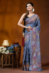 Slate grey multicolor geometric motif silk lambani embroidery saree woman wears blue silk saree 6