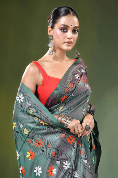 Slate grey tree motif handcrafted silk kantha saree woman wears dark green 2