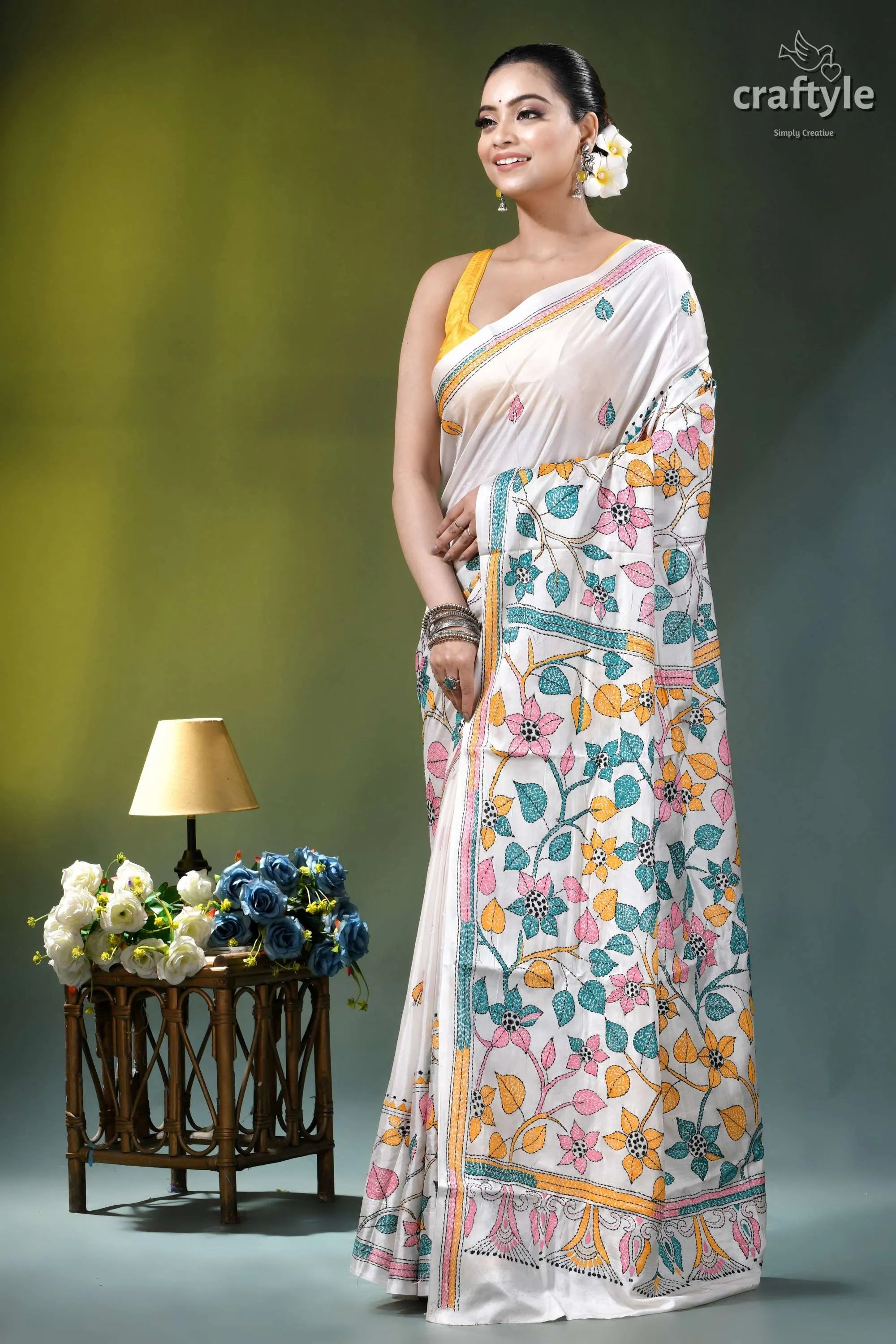Snow white botanical design hand embroidered silk kantha saree woman wears white saree adorned 3