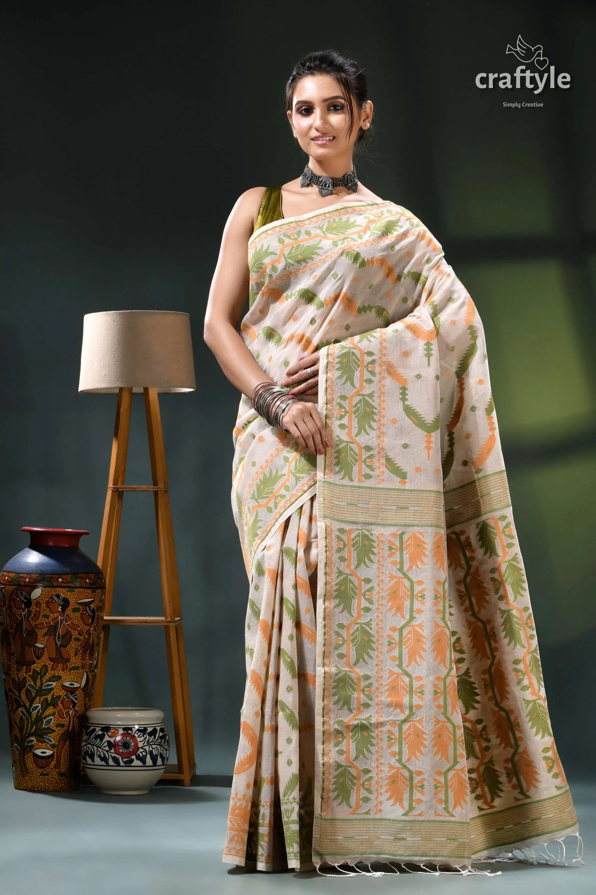 Soft amber cotton jamdani weave saree for women beige green floral patterned saree 1