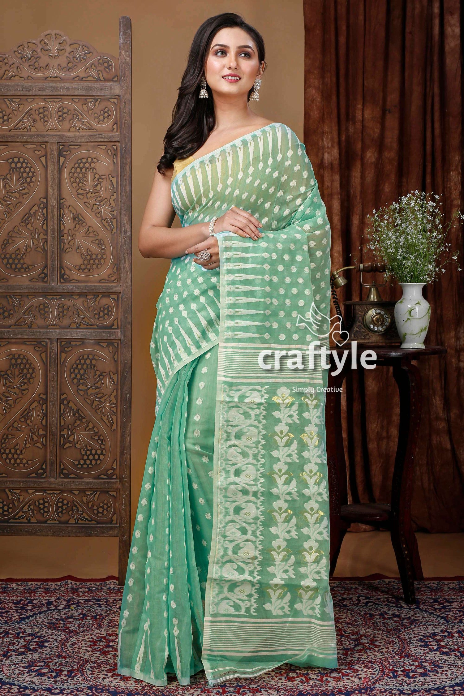 Stunning Aquamarine Green Jamdani Saree with White Weave - Craftyle