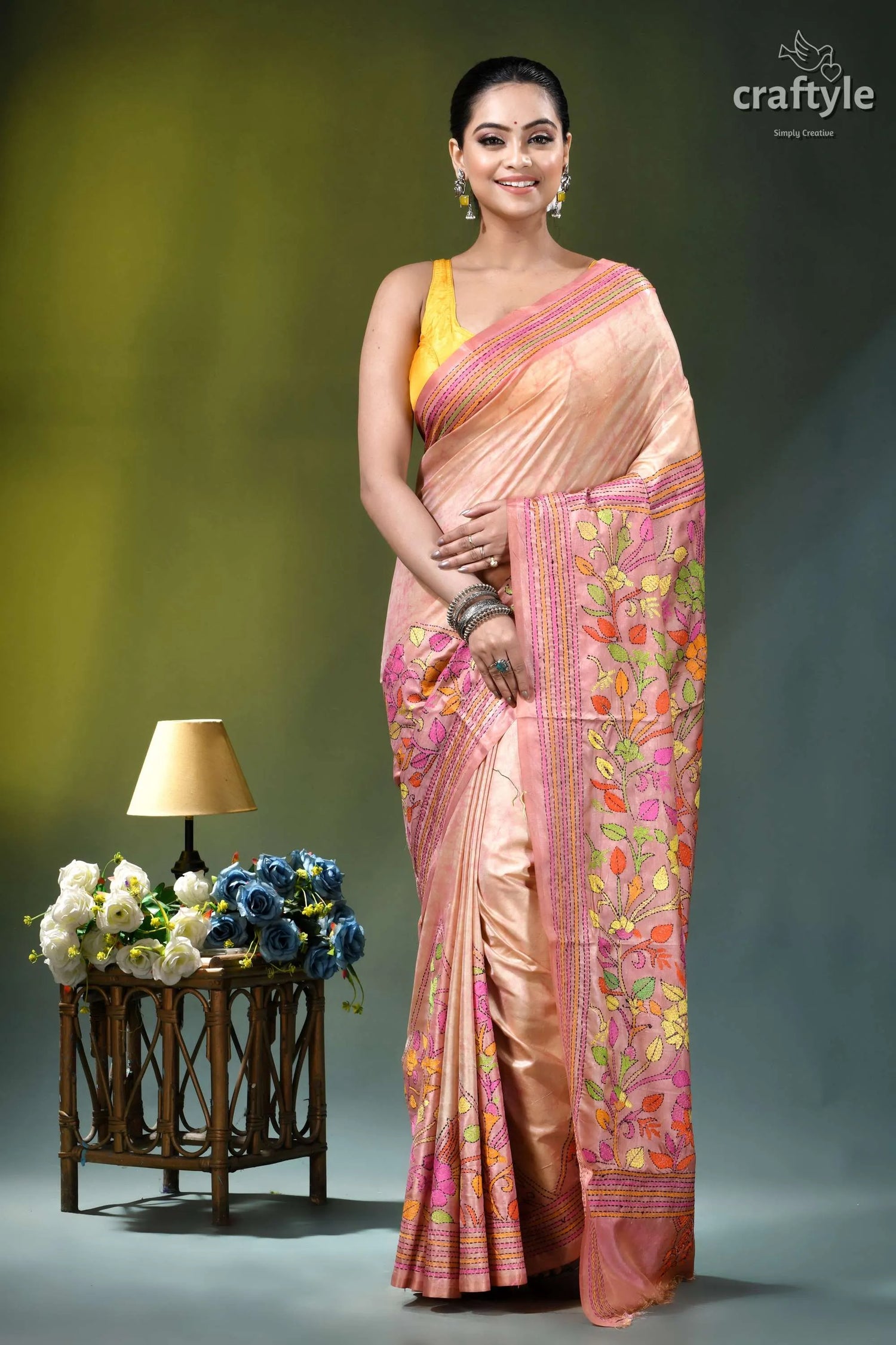 Summer melon floral hand kantha embroidery batik silk saree woman wears peach-colored silk saree 6
