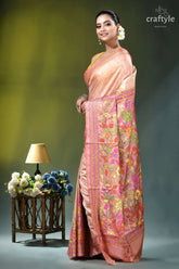 Summer melon floral hand kantha embroidery batik silk saree woman wears peach-colored silk saree 3