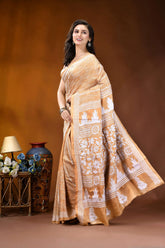 Tan floral motif handcrafted kantha embroidery silk saree woman wears beige white patterned 3