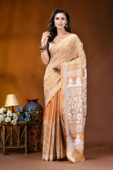 Tan floral motif handcrafted kantha embroidery silk saree woman wears beige white patterned 1