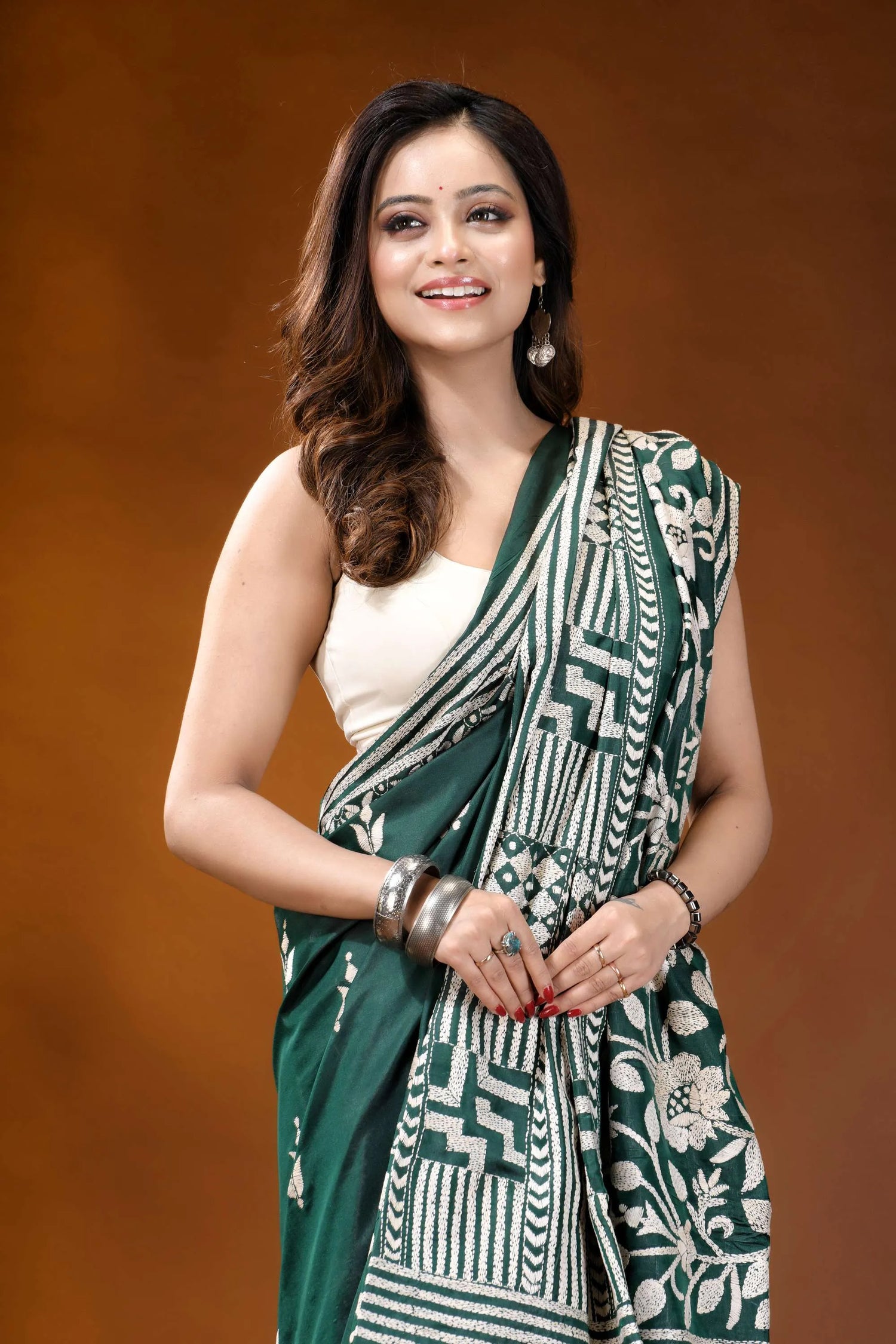 Timber green floral design handcrafted silk kantha stitch saree woman wears vibrant emerald green 2