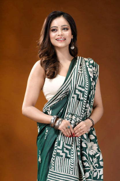 Timber green floral design handcrafted silk kantha stitch saree woman wears vibrant emerald green 2