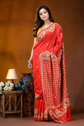 Tomato red ethnic motif handcrafted silk kutch embroidery saree vibrant red saree intricate gold 4