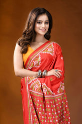 Tomato red ethnic motif handcrafted silk kutch embroidery saree vibrant red saree intricate white 2
