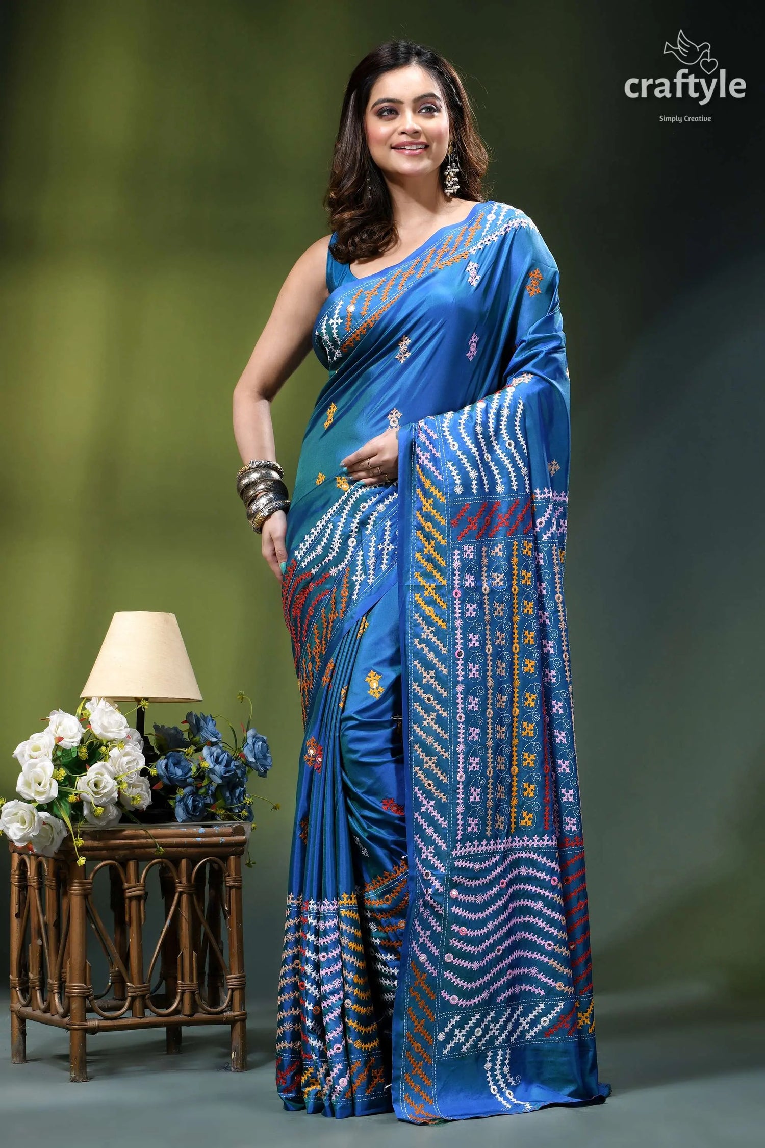 True blue dual-tone gujrati stitch silk saree with mirror detailing vibrant blue silk saree intricate 7