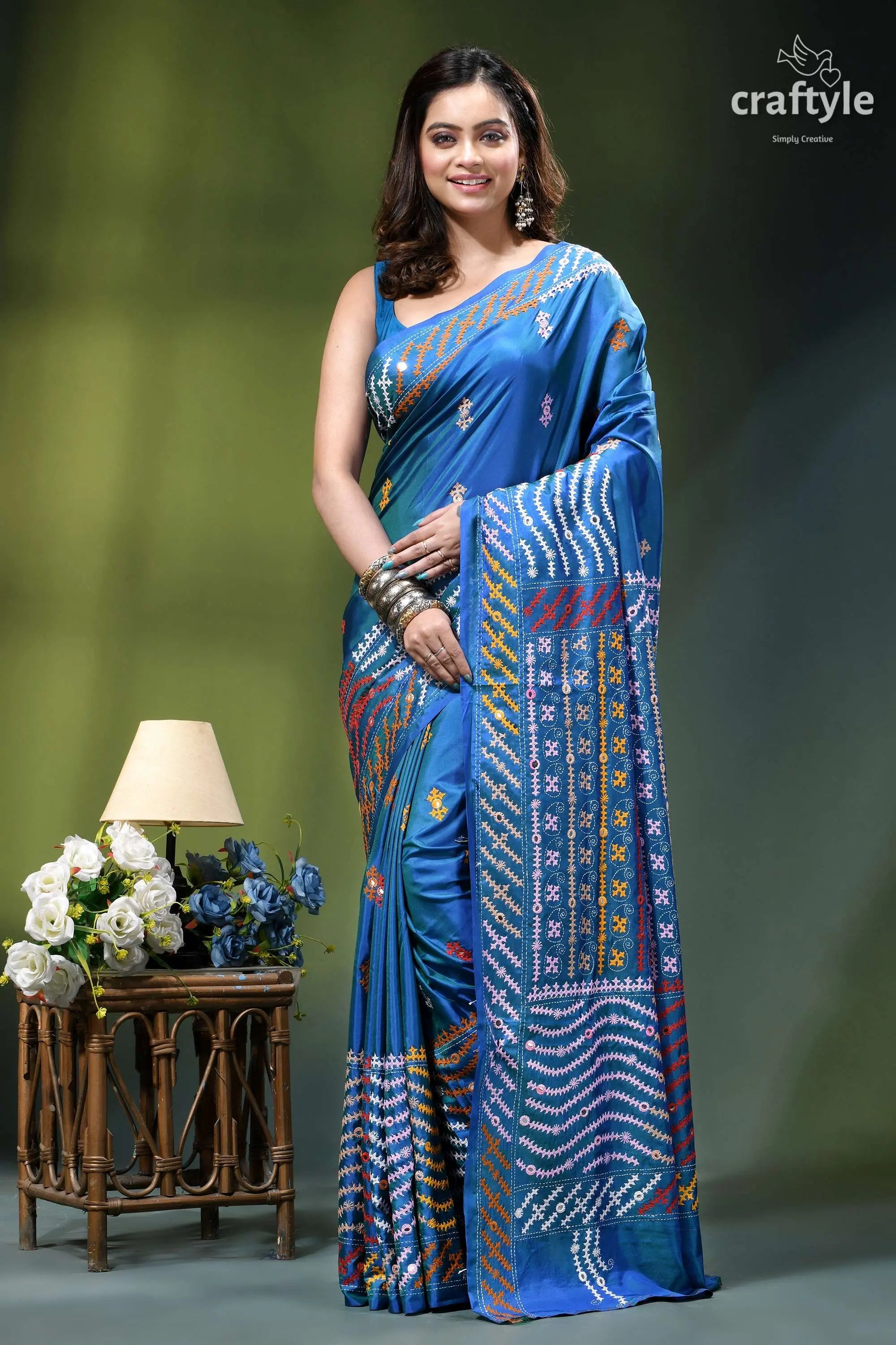 True blue dual-tone gujrati stitch silk saree with mirror detailing vibrant blue silk saree adorned 1