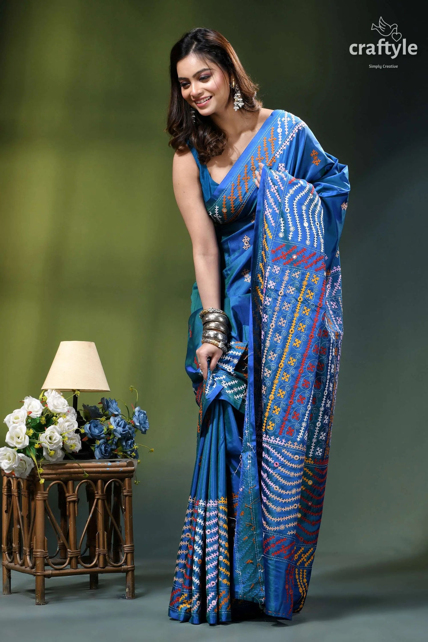 True blue dual-tone gujrati stitch silk saree with mirror detailing vibrant blue saree intricate embroidered 4