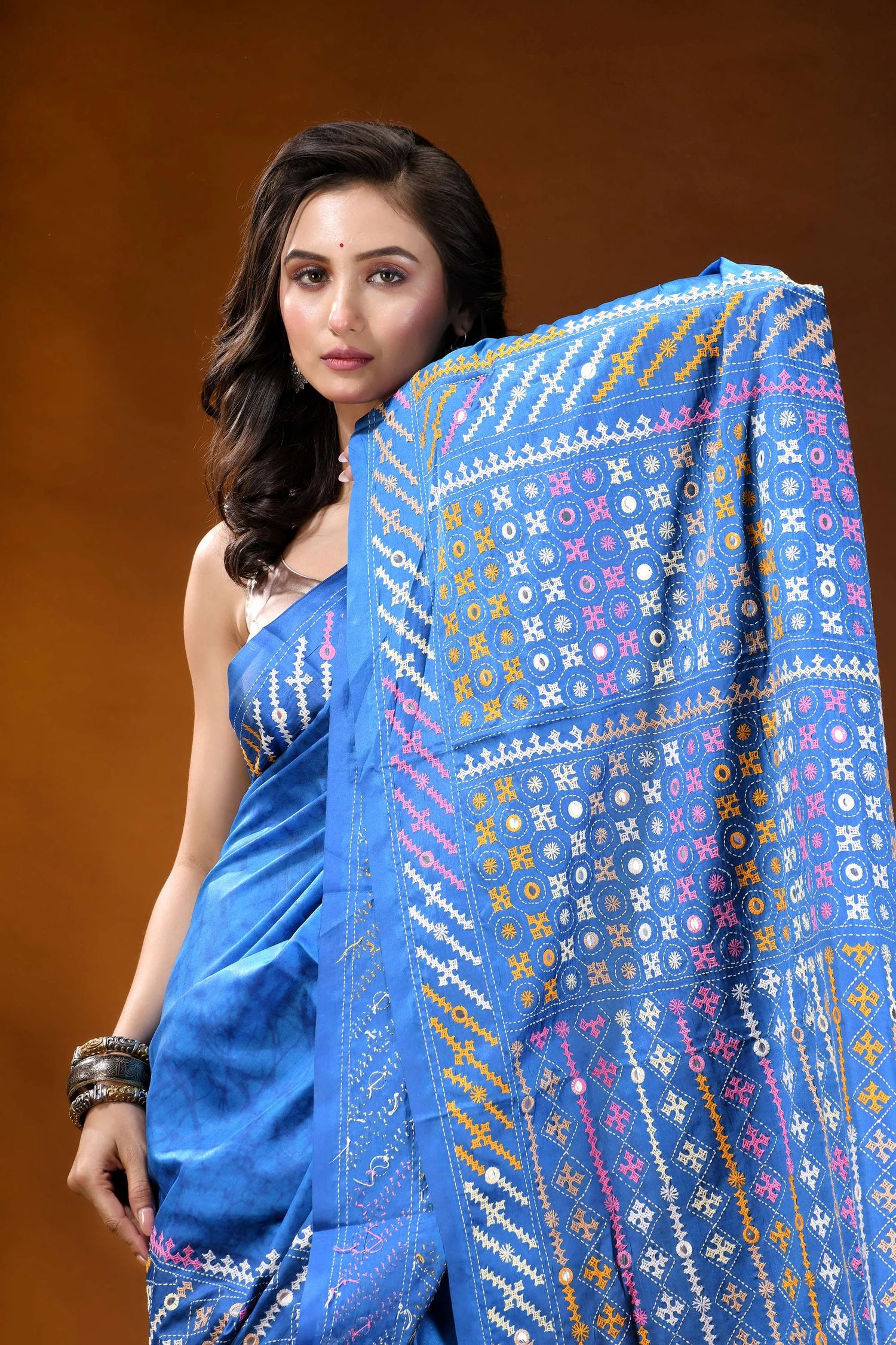 Tufts blue ethnic motif hand wax batik kutch embroidery silk saree - mirror work vibrant blue sari adorned intricate 2