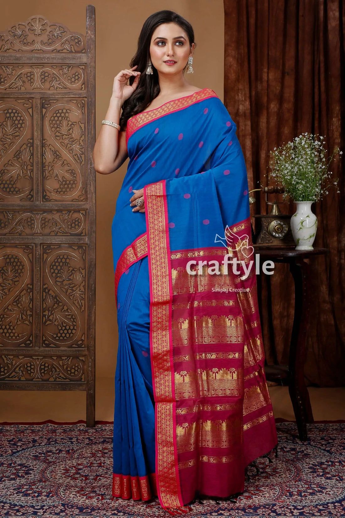Ultramarine blue gadwal silk saree with zari border and butta design blue saree red gold border 1