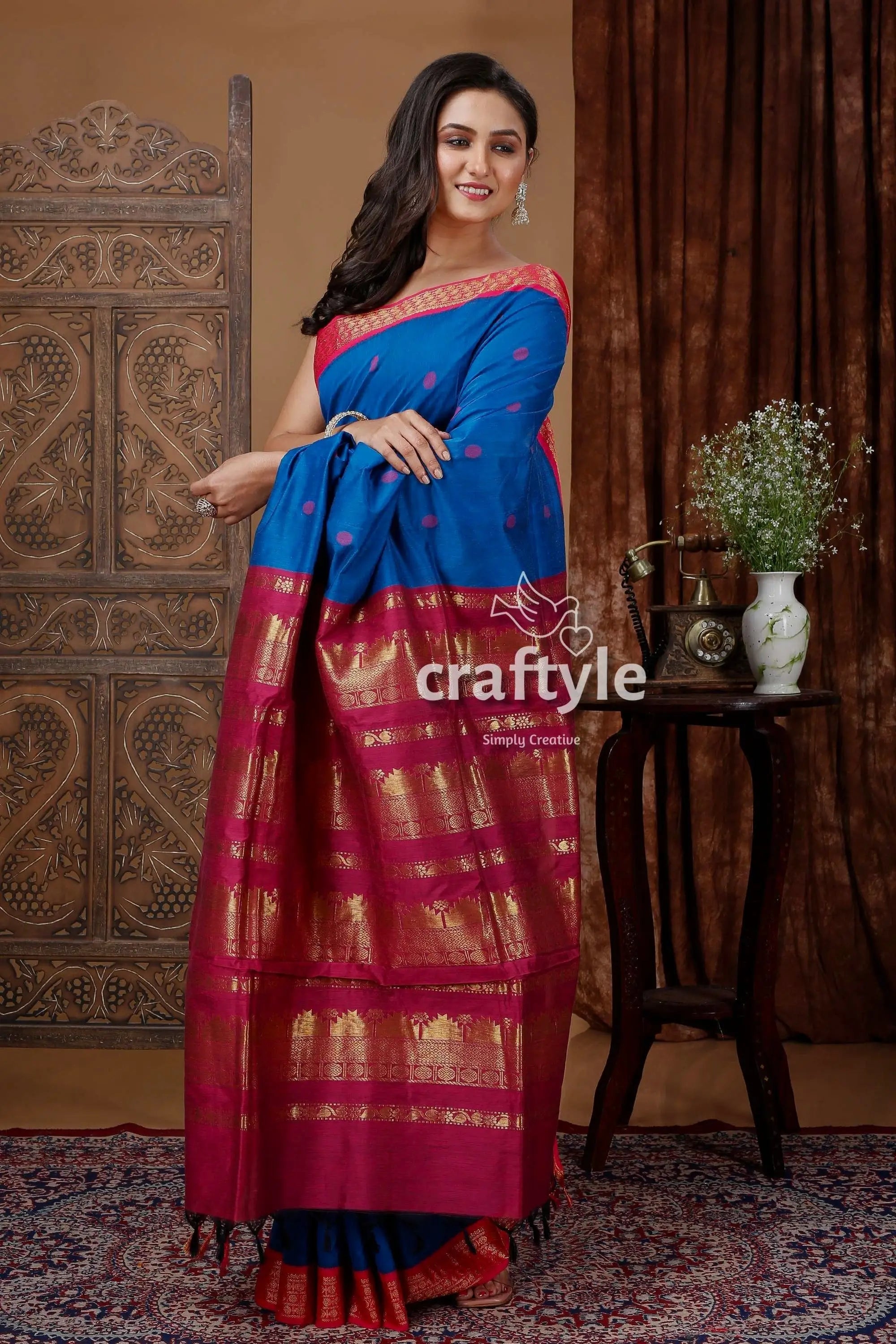 Ultramarine blue gadwal silk saree with zari border and butta design blue pink silk saree 4
