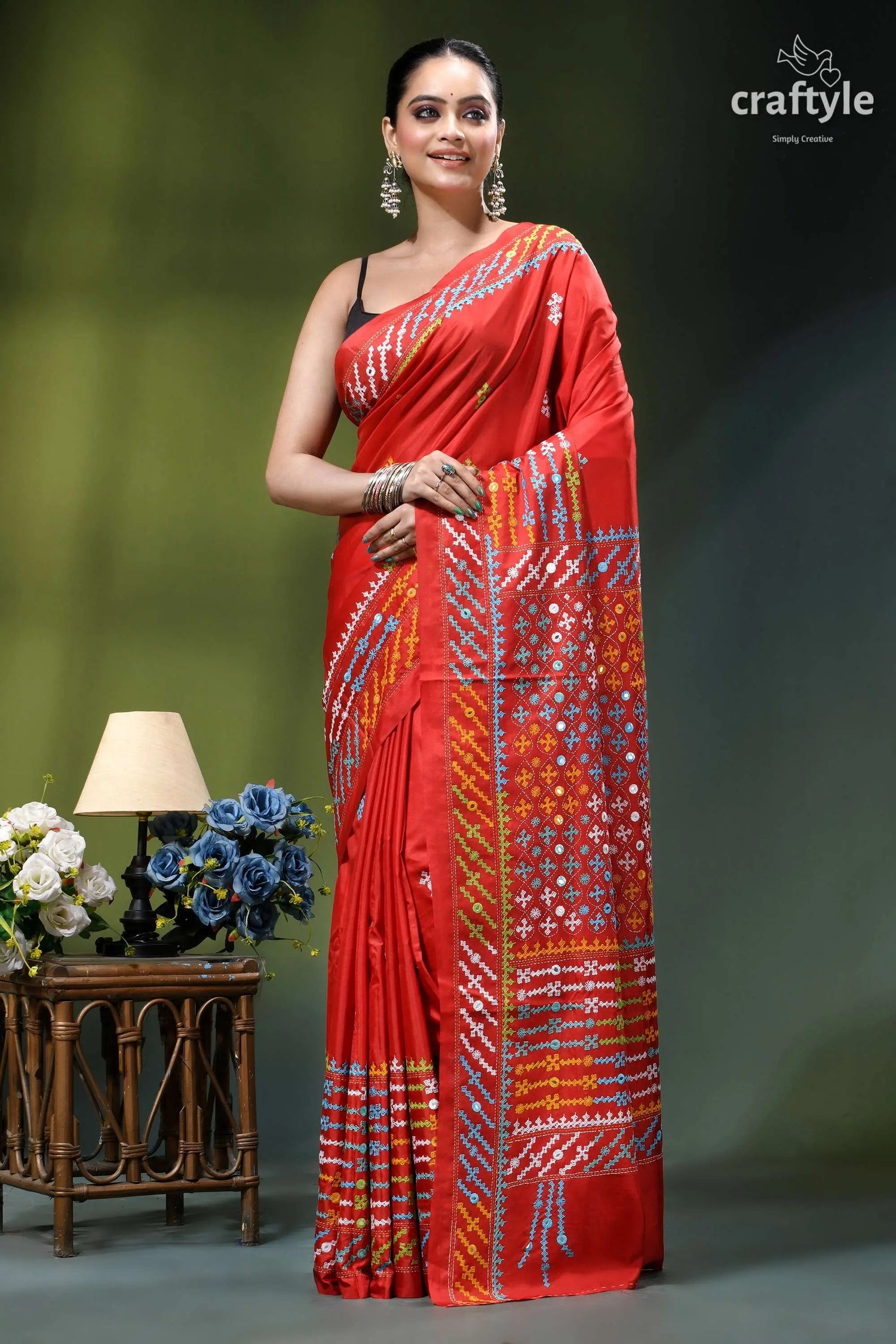 Vivid red intricate gujrati embroidery silk saree with mirror work vibrant red silk saree adorned 7