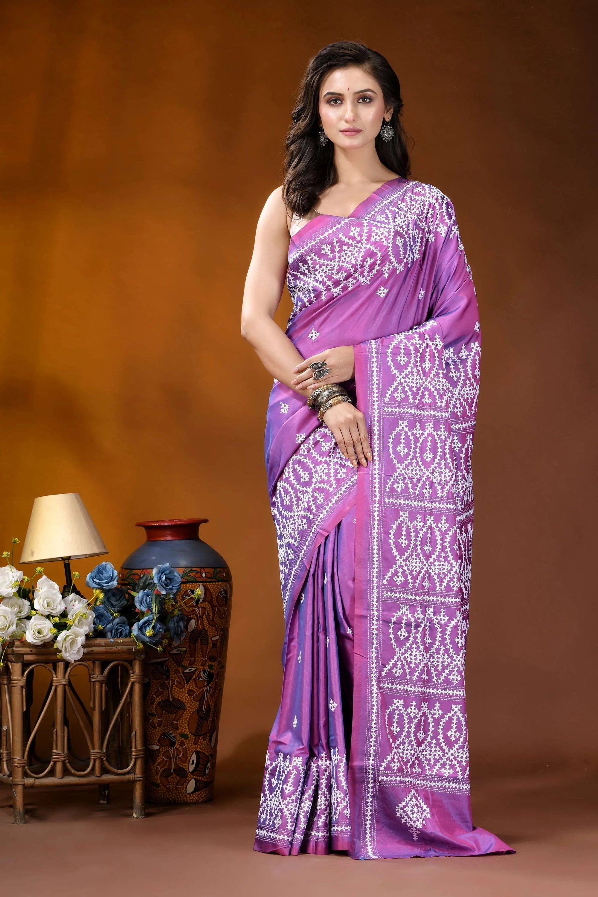 Warm purple kutch embroidery silk saree with ethnic design woman wears vibrant purple saree 1