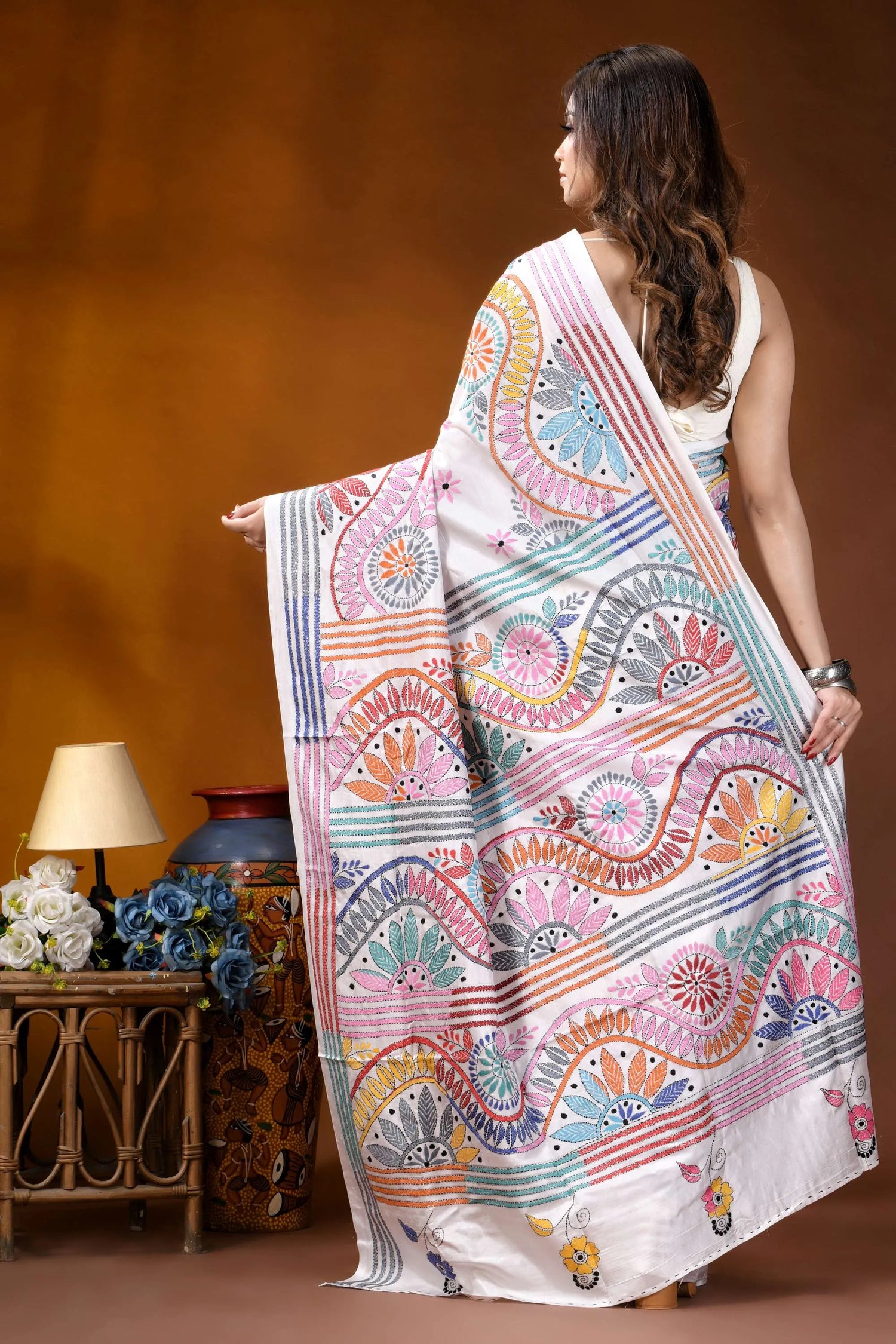 White circular floral design handmade silk kantha stitch saree woman wears white saree adorned 5