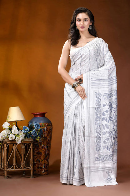 White floral leaf motif hand embroidered kantha silk saree woman wears white saree intricate 1