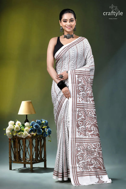 White geometric-floral design silk kantha embroidery saree woman wears white maroon patterned 1