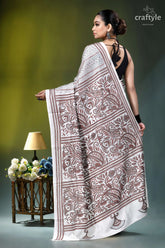 White geometric-floral design silk kantha embroidery saree woman wears white maroon patterned 5